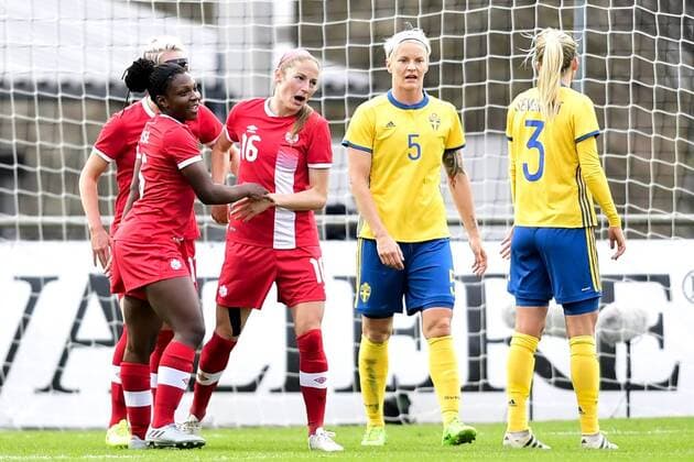170406 Kanadas Janine Beckie jublar med Deanne Rose efter att ha gjort 0-1 under landskampen i fotboll mellan Sverige och Kanada den 6 april 2017 i Trelleborg.  Copyright: PETTERxARVIDSON BB170406PA028