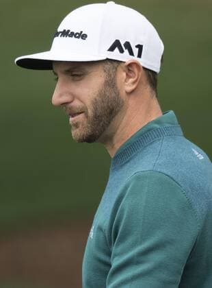 Dustin Johnson is seen on the practice range prior to his first round at the 2017 Masters Tournament at Augusta National Golf Club in Augusta, Georgia on April 6, 2017. Johnson pulled out of the Masters after injuring his back.  AUG20170406341 KEVINxDIETSCH