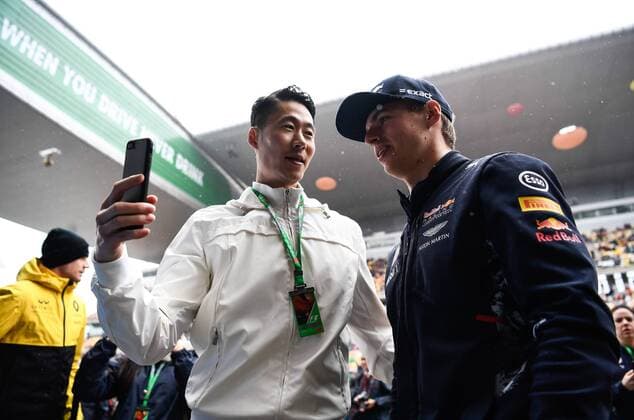 Dutch F1 driver Max Verstappen of Red Bull Racing, right, takes selfies with retired Chinese Table tennis Tischtennis player Wang Liqin ahead of the 2017 Formula One Chinese Grand Prix at the Shanghai International Circuit in Shanghai, China, 9 April 2017. F1 drivers shows off table tennis skills in Shanghai  pbu604570_08