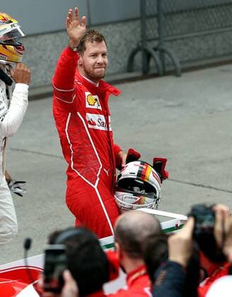 (170409) -- SHANGHAI, April 9, 2017 -- Ferrari s German driver Sebastian Vettel waves to supporters after the Formula One Chinese Grand Prix at the Shanghai International Circuit in Shanghai, east China, April 9, 2017. ) (SP)CHINA-SHANGHAI-F1-2017 CHINESE GRAND PRIX(CN) fanxjun 