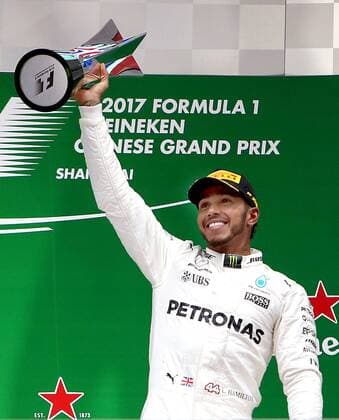 (170409) -- SHANGHAI, April 9, 2017 -- Mercedes driver Lewis Hamilton of Britain celebrates with the trophy on the podium after winning the Formula One Chinese Grand Prix at the Shanghai International Circuit in Shanghai, east China, April 9, 2017. ) (SP)CHINA-SHANGHAI-F1-2017 CHINESE GRAND PRIX(CN) fanxjun 