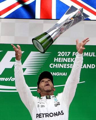 (170409) -- SHANGHAI, April 9, 2017 -- Mercedes driver Lewis Hamilton of Britain celebrates on the podium after winning the Formula One Chinese Grand Prix at the Shanghai International Circuit in Shanghai, east China, April 9, 2017. ) (SP)CHINA-SHANGHAI-F1-2017 CHINESE GRAND PRIX(CN) fanxjun 