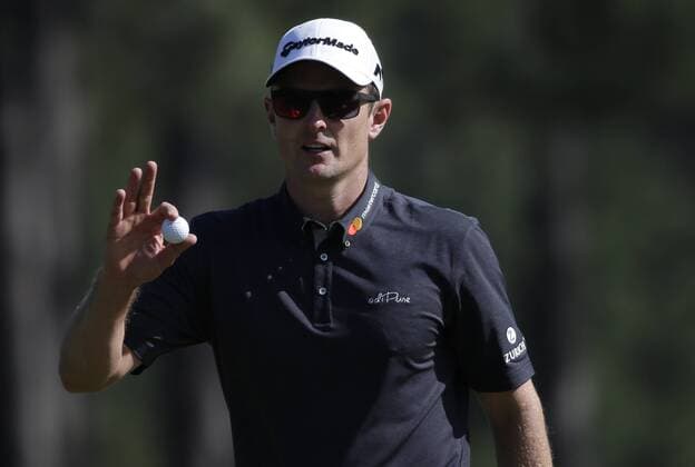 Justin Rose of England reacts as he walks off of the 8th green after making a putt for birdie in the final round at the 2017 Masters Tournament at Augusta National Golf Club in Augusta, Georgia on April 9, 2017.  AUG20170409604 JOHNxANGELILLO