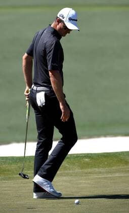 April 9, 2017 - Augusta, GA, USA - Justin Rose glances down at his ball after missing his first putt attempt on the second green during the final round of the Masters Tournament on Sunday, April 9, 2017 at Augusta National Golf Club in Augusta, Ga. 2017 Masters Round 4 - ZUMAm67_ 20170409_zaf_m67_022 Copyright: xJeffxSinerx