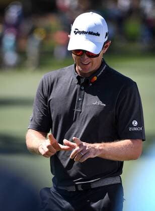 April 9, 2017 - Augusta, GA, USA - Justin Rose walks off the second green talking about by how much he missed his first putt attempt by during the final round of the Masters Tournament on Sunday, April 9, 2017 at Augusta National Golf Club in Augusta, Ga. 2017 Masters Round 4 - ZUMAm67_ 20170409_zaf_m67_028 Copyright: xJeffxSinerx