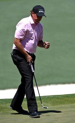 April 9, 2017 - Augusta, GA, USA - Phil Mickelson pumps his fist after sinking a putt on the second green during the final round of the Masters Tournament on Sunday, April 9, 2017 at Augusta National Golf Club in Augusta, Ga. 2017 Masters Round 4 - ZUMAm67_ 20170409_zaf_m67_053 Copyright: xJeffxSinerx