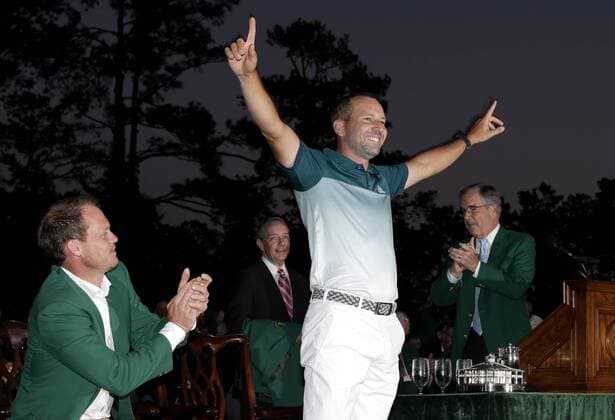 Danny Willett of England watches Sergio Garcia of Spain at the Green Jacket ceremony after Garcia wins the 2017 Masters Tournament at Augusta National Golf Club in Augusta, Georgia on April 9, 2017. Garcia defeated Justin Rose of England in a playoff.  AUG20170409613 JOHNxANGELILLO