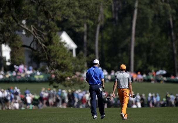 Jordan Spieth and Rickie Fowler shake hands on the 9th green in the final round of the 2017 Masters Tournament at Augusta National Golf Club in Augusta, Georgia on April 9, 2017. Sergio Garcia of Spain defeated Justin Rose of England in a one hole playoff to win his first major championship.  AUG20170409602 JOHNxANGELILLO