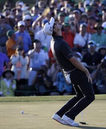 Justin Rose of England reacts after missing a putt for birdie on the 18th green at the 2017 Masters Tournament at Augusta National Golf Club in Augusta, Georgia on April 9, 2017. Garcia defeated Justin Rose of England in a one hole playoff to win his first major championship.  AUG20170409627 JOHNxANGELILLO