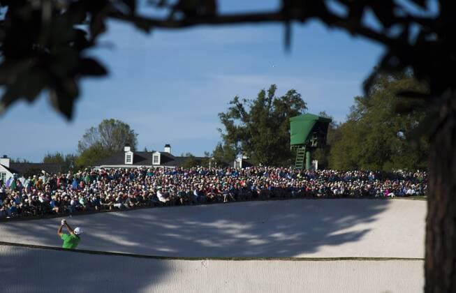 Charl Schwartzel hits out of a bunker on the 18th fairway during the final round of the 2017 Masters Tournament at Augusta National Golf Club in Augusta, Georgia on April 9, 2017. Sergio Garcia won the 2017 Masters.  AUG20170409353 KEVINxDIETSCH