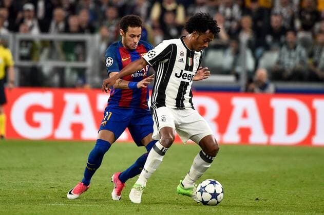 April 11, 2017 - Rome, Italy - Juan Cuadrado of Juventus is challenged by Neymar of FC Barcelona Barca during the UEFA Champions League quarter final match between Juventus and Barcelona at the Juventus Stadium, Turin, Italy on 11 April 2017. Juventus - Barcelona Champions League  - ZUMAn230 20170411_zaa_n230_164 Copyright: xGiuseppexMaffiax