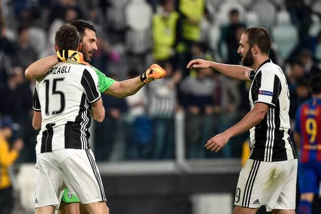 April 11, 2017 - Rome, Italy - Gianluigi Buffon , Andrea Barzagli and Gonzalo Higuain of Juventus celebrate the victory during the UEFA Champions League quarter final match between Juventus and Barcelona at the Juventus Stadium, Turin, Italy on 11 April 2017. Juventus - Barcelona Champions League  - ZUMAn230 20170411_zaa_n230_212 Copyright: xGiuseppexMaffiax