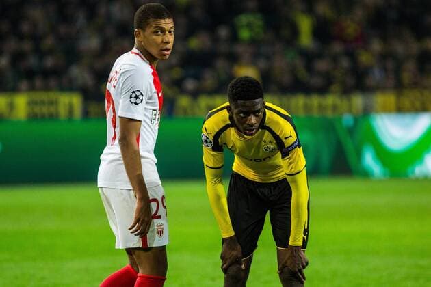 GER, UEFA CL, Borussia Dortmund (GER) vs AS MONACO FC (MCO) 12.04.2017, Signal Iduna Park, Dortmund, GER, UEFA CL, Borussia Dortmund (GER) vs AS MONACO FC (MCO), im Bild picture shows Ousmane Dembele (Borussia Dortmund 7) mit Kylian Mbappe (AS Monaco 29), Foto © nordphoto Rauch Local Caption nordphotox xRauch