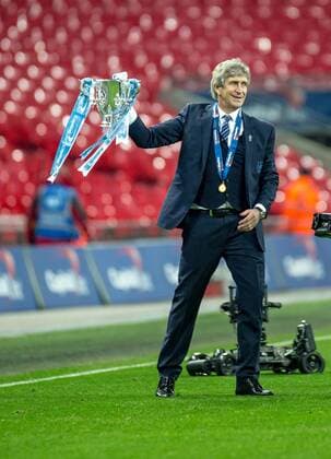 Manuel Pellegrini manager of Manchester City with the Cup during the Capital One Cup Final match between Liverpool and Manchester City at Wembley Stadium, London, on the 28th February 2016. Copyright: xLiamxMcAvoyx 08910125