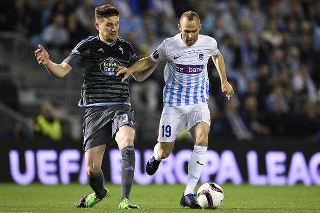 Celta s Andreu Fontas and Genk s Thomas Buffel fight for the ball during a soccer game between Spanish club Real Club Celta de Vigo and Belgian team KRC Genk, Thursday 13 April 2017, in Vigo, Spain, the first leg of the quarter finals of the Europa League competition. YORICKxJANSENS  x05081219x