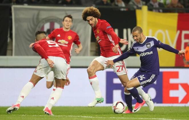 Manchester s Marouane Fellaini and Anderlecht s Sofiane Hanni fight for the ball during a soccer game between Belgian team RSC Anderlecht and English club Manchester United ManU F.C. in Brussels, Thursday 13 April 2017, the first leg of the quarter finals of the Europa League competition. VIRGINIExLEFOUR  x05081238x