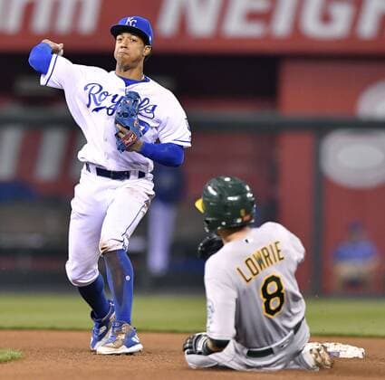 April 13, 2017 - Kansas City, MO, USA - Kansas City Royals second baseman Raul Mondesi forces out the Oakland Athletics Jed Lowrie (8) at second and completes the double play to end the top of the fourth inning at Kauffman Stadium in Kansas City, Mo., on Thursday, April 13, 2017. Oakland at Kansas City - ZUMAm67_ 20170413_zaf_m67_056 Copyright: xJohnxSleezerx