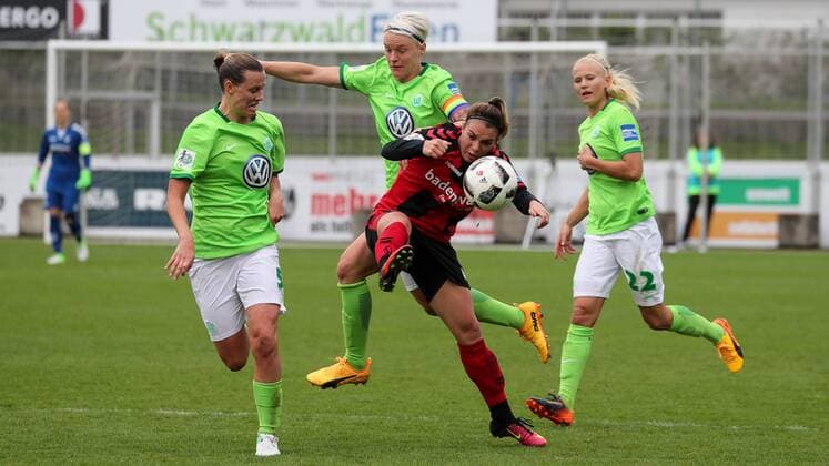 v.li.: Emily van Egmond (Wolfsburg, 5), Nilla Fischer (Wolfsburg, 4), Sandra Starke (Freiburg, 13), Pernille Harder (Wolfsburg, 22), Zweikampf, Duell, duel, tackle, tackling, Dynamik, Action, Aktion, Fussball, DFB-Pokal der Frauen, Halbfinale, SC Freiburg - VfL Wolfsburg, xozx