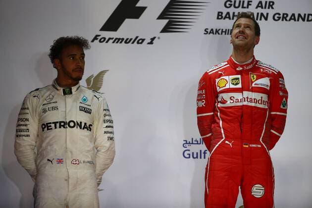Bahrain Grand Prix, Sakhir 13 - 16 April 2017 16.04.2017 - Race, 2nd place Lewis Hamilton (GBR) Mercedes AMG F1 W08 and Sebastian Vettel (GER) Scuderia Ferrari SF70H race winner 