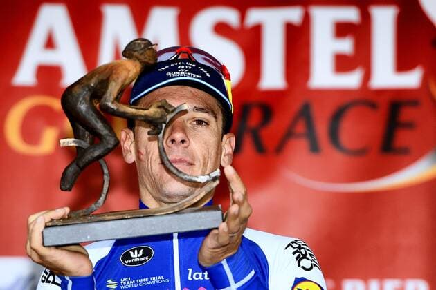 Belgian Philippe Gilbert of Quick-Step Floors celebrates on the podium with the trophy after winning the 52nd edition of the Amstel Gold Race one day cycling race, 121,6 km from Maastricht to Valkenburg, The Netherlands, Sunday 16 April 2017. YORICKxJANSENS  x05082560x