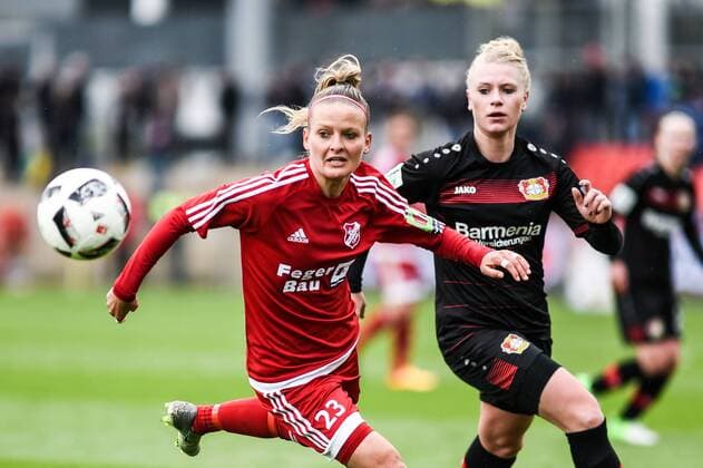 v.li.: Isabelle Meyer (SC Sand, 23) im Zweikampf mit Merle Barth (Bayer 04 Leverkusen 9), Zweikampf, Duell, duel, tackle, tackling, Dynamik, Action, Aktion, Fussball, DFB-Pokal, Halbfinale, Bayer 04 Leverkusen - SC Sand, xmhx