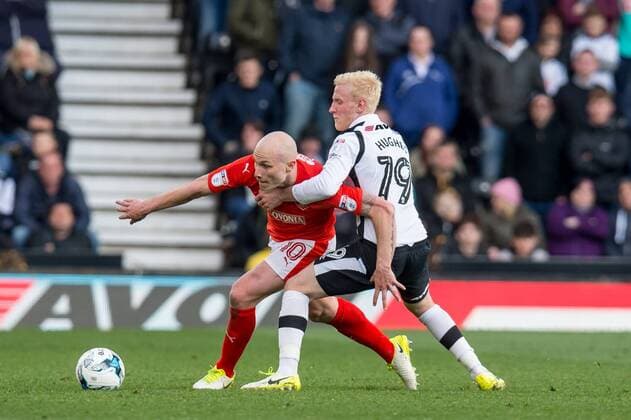 Will Hughes of Derby County fouls Aaron Mooy of Huddersfield Town during the EFL Sky Bet Championship match between Derby County and Huddersfield Town at the Pride Park Stadium, Derby, England on 17 April 2017. Copyright: xMatthewxBuchanx 15020054