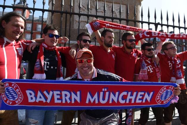 Spain: Bayern Munich supporters in Madrid Nearly 4,200 Bayern fans travel to Madrid to watch the UEFA Champions League quarter-final match between Real Madrid (Spain) and Bayern Munich (Germany). Supporters congregate in Plaza Mayor and Puerta of Sol, in central Madrid.  JorgexSanzx xPacificxPress
