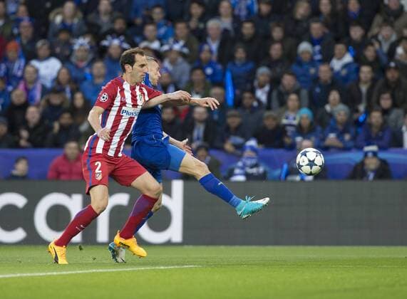 April 18th 2017, Leicester, England, UEFA Champions League football quarter-final, Leicester City versus Atletico Madrid; Jamie Vardy of Leicester City on the ball is tackled by Diego Roberto Godin Leal of Atletico Madrid xRolandxHarrisonx  ActionPlus11869602