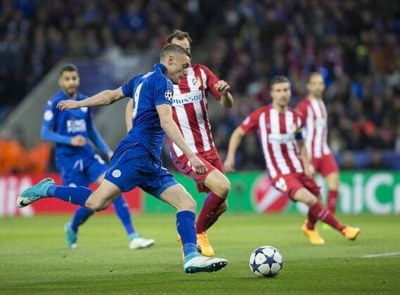April 18th 2017, Leicester, England, UEFA Champions League football quarter-final, Leicester City versus Atletico Madrid; Jamie Vardy of Leicester City prepares to cross the ball in to the Atletico Madrid goal area as Diego Roberto Godin Leal of Atletico Madrid comes in to block xRolandxHarrisonx  ActionPlus11869605