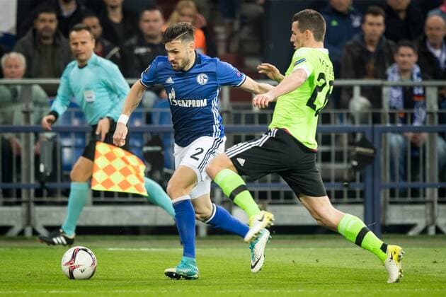 (L-R) Daniel Caligiuri of FC Schalke 04, Nick Viergever of Ajaxduring the UEFA Europa League quarter final match between Schalke 04 and Ajax Amsterdam on April 20, 2017 at the Veltins-Arena in Gelsenkirchen, Germany. Schalke 04 v Ajax UEFA Europa League 2016 2017 xVIxRonaldxBonestrooxfotografiexIVx 7615000