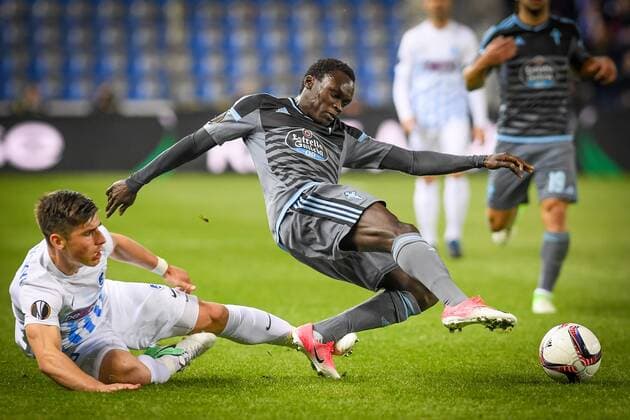 Genk s Ruslan Malinovsky and Celta s Pione Sisto fight for the ball during the return leg of quarterfinals in the Europa League competition between Belgian soccer team RC Genk and Spanish team Celta Vigo, Thursday 20 April 2017, in Genk. First leg ended on a 2-3 result in Spain. LUCxCLAESSEN  x05084095x