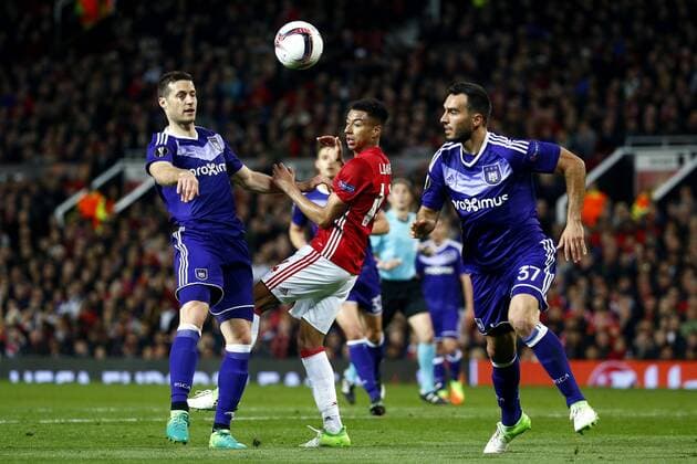 MANCHESTER, ENGLAND - 20 APRIL : Uros Spajic defender of RSC Anderlecht andIvan Obradovic defender of RSC Anderlecht and Jesse Lingard of Mancheter United during the match between Manchester United ManU and Rsc Anderlecht - UEFA Europa League quarter final second leg in the Old Trafford stadion, 20 04 2017. FOOTBALL : Manchester United v Rsc Anderlecht - UEFA Europa League - 20 04 2017 PHOTONEWS PANORAMIC  700023046