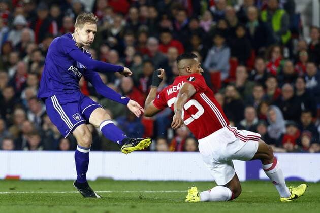 MANCHESTER, ENGLAND - 20 APRIL : Lukasz Teodorczyk forward of RSC Anderlecht and Antonio Valencia of Mancheter United during the match between Manchester United ManU and Rsc Anderlecht - UEFA Europa League quarter final second leg in the Old Trafford stadion, 20 04 2017. FOOTBALL : Manchester United v Rsc Anderlecht - UEFA Europa League - 20 04 2017 PHOTONEWS PANORAMIC  700023046
