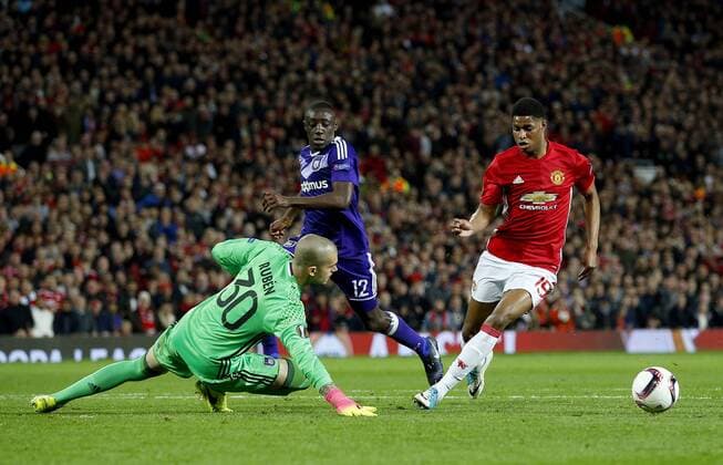 Marcus Rashford of Manchester United ManU takes the ball around Ruben of Anderlecht during the UEFA Europa League Quarter Final 2nd Leg match at Old Trafford, Manchester. Picture date: April 20th, 2017. Pic credit should read: Matt McNulty Sportimage EDITORIAL USE ONLY. No use with unauthorised audio, video, data, fixture lists, club league logos or live services. Online in-match use limited to 120 images, no video emulation. No use in betting, games or single club league player publications.