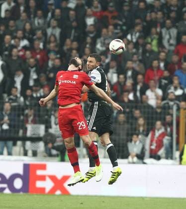 Besiktas player Dusko Tosic and Lyon Players Lucas Tousart 29 during the Europa league Quarter final second match between Besiktas and Lyon at the Vodafone Arena in Istanbul , Turkey April 20, 2017. 