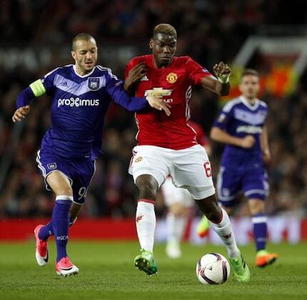 Paul Pogba of Manchester United ManU and Sofiane Hanni of Anderlecht during the UEFA Europa League Quarter Final 2nd Leg match at Old Trafford, Manchester. Picture date: April 20th, 2017. Pic credit should read: Matt McNulty Sportimage EDITORIAL USE ONLY. No use with unauthorised audio, video, data, fixture lists, club league logos or live services. Online in-match use limited to 120 images, no video emulation. No use in betting, games or single club league player publications.