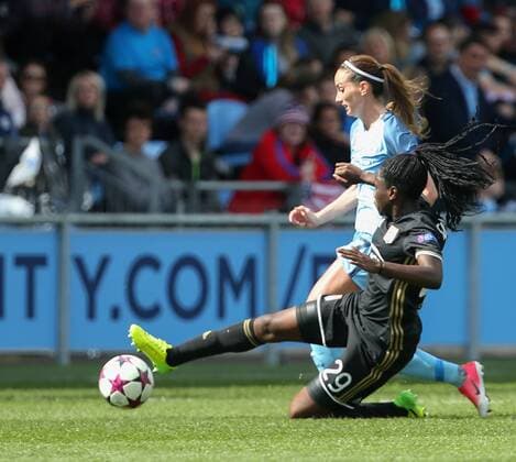 April 22nd 2017, Academy Stadium, Manchester, Lancashire England; Womens UEFA Champions League football semi-final, Manchester City Ladies versus Lyon Ladies; Griedge Mbock of Olympique Lyonnais stretches to tackle Jill Scott of Manchester City xDavidxBlunsdenx  ActionPlus11870640