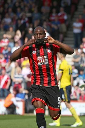 Football - 2016 2017 Premier League - AFC Bournemouth vs. Middlesbrough Bournemouth s Benik Afobe kisses his black arm band, worn in a mark of respect to Ugo Ehiogu after scoring at the Vitality Stadium (Dean Court) Bournemouth COLORSPORT SHAUN BOGGUST 