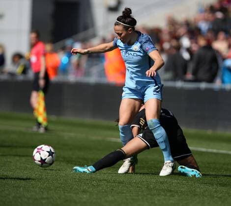 April 22nd 2017, Academy Stadium, Manchester, Lancashire England; Womens UEFA Champions League football semi-final, Manchester City Ladies versus Lyon Ladies; Lucy Bronze of Manchester City tangles with Wendie Renard of Olympique Lyonnais xDavidxBlunsdenx  ActionPlus11870716
