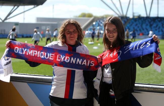 April 22nd 2017, Academy Stadium, Manchester, Lancashire England; Womens UEFA Champions League football semi-final, Manchester City Ladies versus Lyon Ladies; Two Lyon fans pose for a photo as the teams warm up xDavidxBlunsdenx  ActionPlus11870927