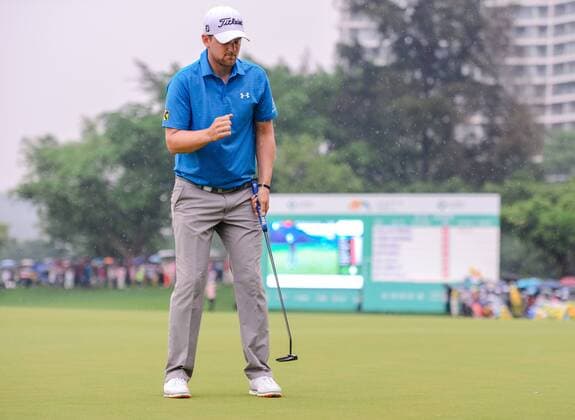 Bernd Wiesberger of Austria reacts in the final match of the 2017 Shenzhen International Golf Tournament in Shenzhen city, south China s Guangdong province, 23 April 2017. Austrian Bernd Wiesberger beat England s Tommy Fleetwood in a playoff on Sunday (23 April 2017) to win the Shenzhen International. Wiesberger went into the final round with a three-shot lead and eight shots ahead of Fleetwood but the Englishman fired a 63 to finish tied at 16 under. Wiesberger s 71 featured par saves on the 12th and 17th and he nearly hit the pin with his approach to the last hole but was forced to settle for a par and a trip back up the 18th. Wiesberger hit his drive in the playoff over the water off the tee and ended up in the bank while Fleetwood played safely onto the fairway and found the heart of the green with his second shot. The pressure was on Wiesberger and he delivered, placing his approach to five feet and making the putt for a birdie. Bubba Watson takes the lead at 2017 Shenzhen International  20170423_35943