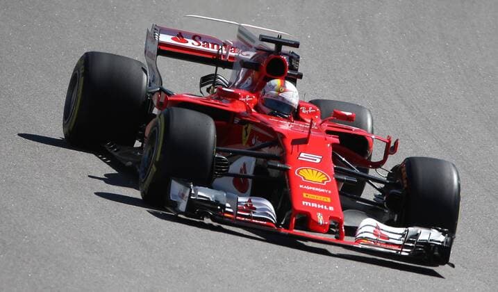 SOCHI, RUSSIA - APRIL 28, 2017: German racing driver Sebastian Vettel of the Scuderia Ferrari F1 team takes part in a practice session ahead of the 2017 Formula One VTB Russian Grand Prix at the Sochi Autodrom racing circuit. Alexander Demianchuk TASS  TS049FB4