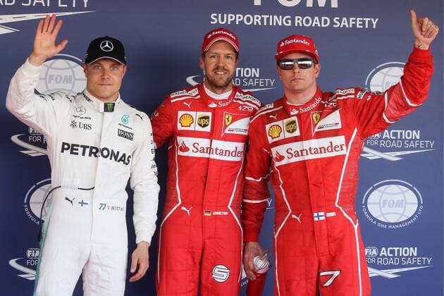 SOCHI, RUSSIA - APRIL 29, 2017: Mercedes AMG Petronas F1 driver Valtteri Bottas of Finland, Scuderia Ferrari F1 drivers Sebastian Vettel of Germany and Kimi Raikkonen of Finland, from left, waving after a qualifying session for the 2017 Formula One Russian Grand Prix at the Sochi Autodrom racing circuit. Vyacheslav Prokofyev TASS  TS04A27B