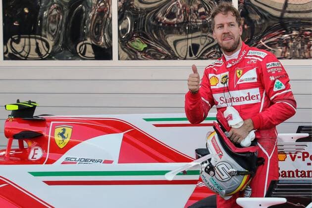 SOCHI, RUSSIA - APRIL 29, 2017: Scuderia Ferrari F1 driver Sebastian Vettel of Germany shows a thumbs up after a qualifying session for the 2017 Formula One Russian Grand Prix at the Sochi Autodrom racing circuit. Vyacheslav Prokofyev TASS  TS04A2B3