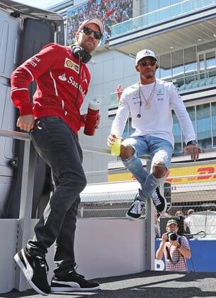 SOCHI, RUSSIA - APRIL 30, 2017: Scuderia Ferrari F1 Team driver Sebastian Vettel (L) of Germany and Mercedes AMG Petronas F1 Team driver Lewis Hamilton of the United Kingdom seen ahead of the 2017 Formula One Russian Grand Prix at the Sochi Autodrom racing circuit. Vyacheslav Prokofyev TASS  TS04A361