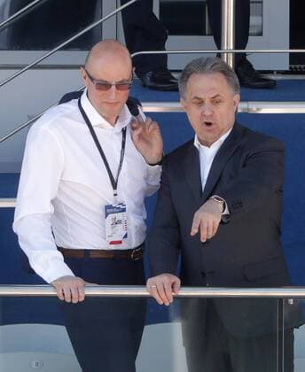 SOCHI, RUSSIA - APRIL 30, 2017: Kontinental Hockey League (KHL) President Dmitry Chernyshenko (L) and Russia s Deputy Prime Minister Vitaly Mutko watch the 2017 Formula One Russian Grand Prix at the Sochi Autodrom racing circuit. Mikhail Metzel TASS  TS04A378