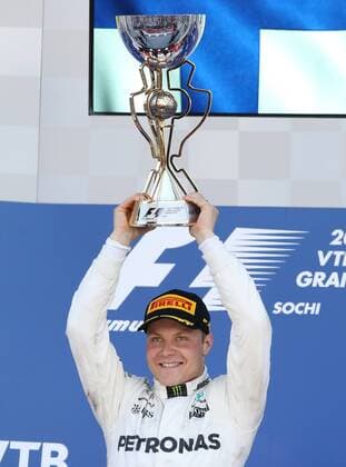 SOCHI, RUSSIA - APRIL 30, 2017: Frst-placed Mercedes AMG Petronas F1 driver Valtteri Bottas lifts the trophy on the podium after the 2017 Formula One Russian Grand Prix at the Sochi Autodrom racing circuit. Vyacheslav Prokofyev TASS  TS04A3A0