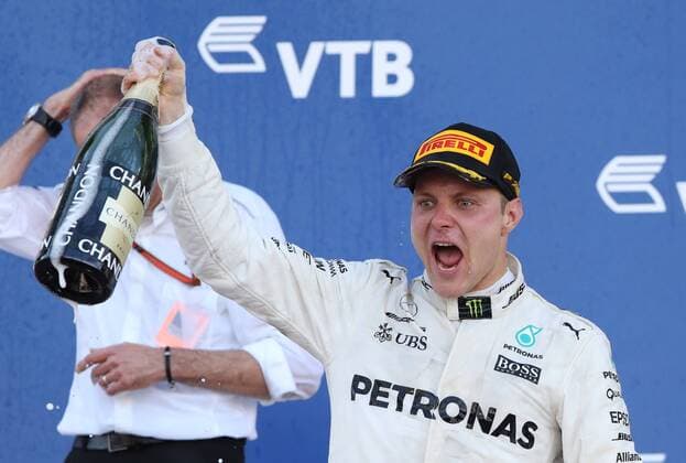 SOCHI, RUSSIA - APRIL 30, 2017: Frst-placed Mercedes AMG Petronas F1 driver Valtteri Bottas celebrates on the podium after the 2017 Formula One Russian Grand Prix at the Sochi Autodrom racing circuit. Vyacheslav Prokofyev TASS  TS04A3A8