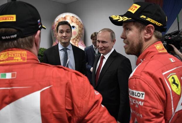 SOCHI, RUSSIA - APRIL 30, 2017: Second-placed Scuderia Ferrari F1 driver Sebastian Vettel of Germany and Russia s President Vladimir Putin (R-L) seen after the podium ceremony for the 2017 Formula One Russian Grand Prix at the Sochi Autodrom racing circuit. Alexei Nikolsky Russian Presidential Press and Information Office TASS  TS04A422