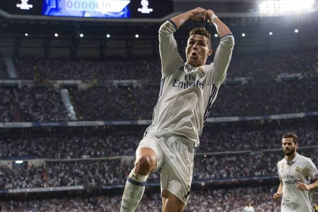 Partido de ida de semifinales de la Liga de Campeones entre el Real Madrid y el Atletico en el Bernabeu. En la imagen, Cristiano Ronaldo celebra su tercer gol. First leg of Champions League semifinals between Real Madrid and Atletico. In this picture, Cristiano Ronaldo celebrates his third goal. xJUANxAGUADOx 